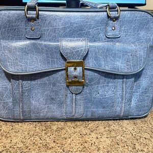 F.W. Woolworth’s Vintage Light Blue Suitcase. 
Shoulder strap included.